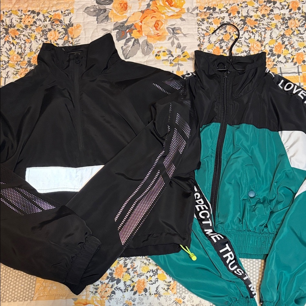 2 cropped windbreakers